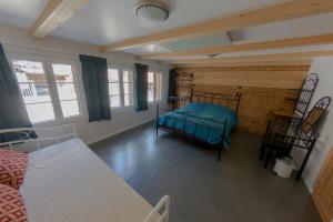 Ένα ή περισσότερα κρεβάτια σε δωμάτιο στο Chalet 1752