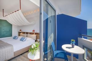 Un ou plusieurs lits dans un hébergement de l'établissement Lordos Beach Hotel & Spa