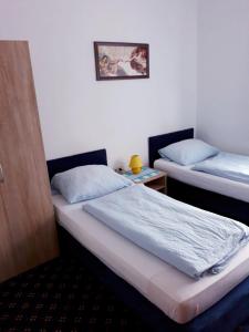 Hotel Elsenztal tesisinde bir odada yatak veya yataklar