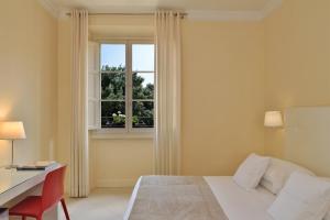Postel nebo postele na pokoji v ubytování Residenza Fiorentina