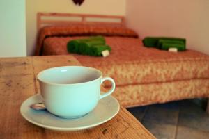 Ein Bett oder Betten in einem Zimmer der Unterkunft Trullo al Monte