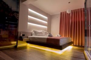 Postel nebo postele na pokoji v ubytování Hotel Pandora Residence