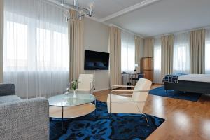 TV a/nebo společenská místnost v ubytování Elite Stadshotellet Växjö