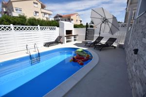 Bazén v ubytování Diva Apartment nebo v jeho okolí