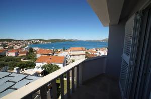 a balcony with a view of the water at Apartments Gazebo in Trogir