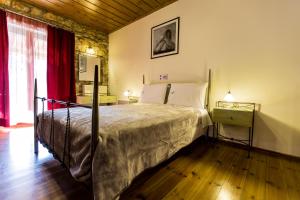 Postel nebo postele na pokoji v ubytování Village Inn