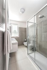 Ένα μπάνιο στο Apartments Giuliana +35 φωτογραφίες