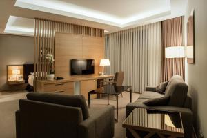 Telewizja i/lub zestaw kina domowego w obiekcie Tiffi Boutique Hotel