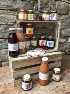 a display of jars of preserves and jams at Agriturismo La Tensa in Domodossola