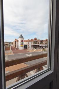 a view of a street from a window at APPARTEMENT 4 PERSONNES CLASSE 2 ETOILES LEBOUCQ Laurent in Fort-Mahon-Plage