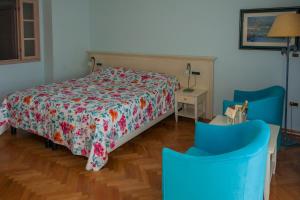 Postel nebo postele na pokoji v ubytování Hotel Miramar