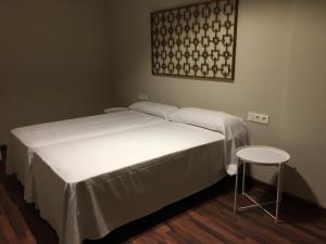 A bed or beds in a room at Mares - Bellamar