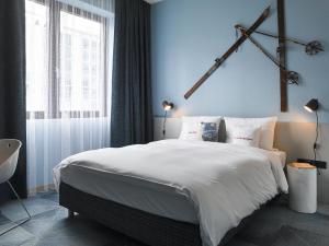 Cama ou camas em um quarto em 25hours Hotel The Trip