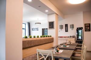 Reštaurácia alebo iné gastronomické zariadenie v ubytovaní Penzion Šafrán