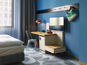 Cama ou camas em um quarto em 25hours Hotel The Trip