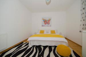 Voodi või voodid majutusasutuse Rooms Leda toas