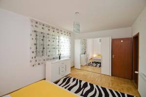 Voodi või voodid majutusasutuse Rooms Leda toas
