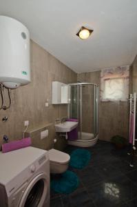 Vannituba majutusasutuses Rooms Leda
