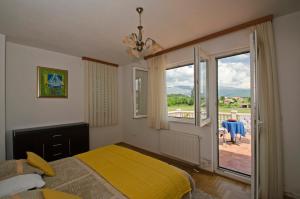Voodi või voodid majutusasutuse Rooms Leda toas