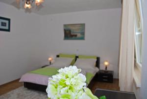 Voodi või voodid majutusasutuse Rooms Leda toas