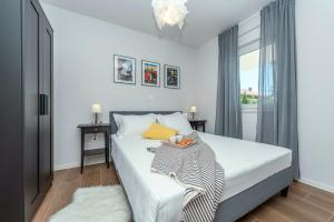 Posteľ alebo postele v izbe v ubytovaní Villa BLACK&BEAUTY