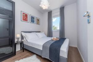 Posteľ alebo postele v izbe v ubytovaní Villa BLACK&BEAUTY