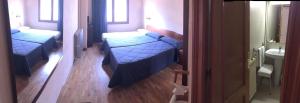 Hotel Bon Reposにあるベッド