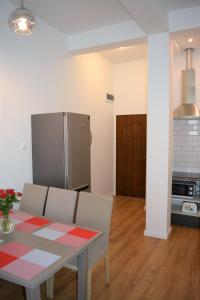 Kuchnia lub aneks kuchenny w obiekcie Apartamenty Jantar