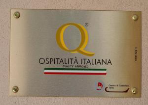 a sign that reads ospritica italia currently approved at Agriturismo Il Casaletto in Montefranco