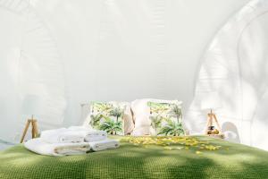 Tempat tidur dalam kamar di Somn'en Bulle