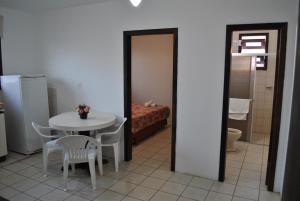 Ванная комната в Residencial Sol e Mar de Floripa +31 фотография