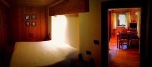 Posteľ alebo postele v izbe v ubytovaní Appartamento Valle di Gressoney