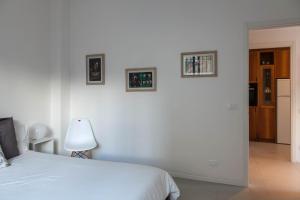 Postel nebo postele na pokoji v ubytování Macchia home