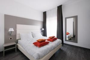Ένα ή περισσότερα κρεβάτια σε δωμάτιο στο Hotel Cala Di Forno