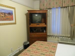 Postel nebo postele na pokoji v ubytování Hotel San Carlos