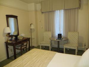 Postel nebo postele na pokoji v ubytování Hotel San Carlos