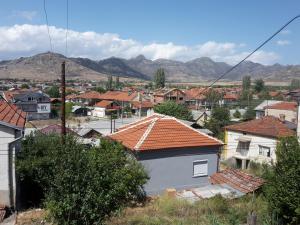 a town with houses and mountains in the background at Iliovski Inn - Just Like Home in Prilep