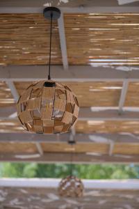 a chandelier hanging from a ceiling in a room at Argilos in Sidari
