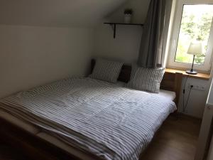 Postel nebo postele na pokoji v ubytování Kovárna Černá Voda
