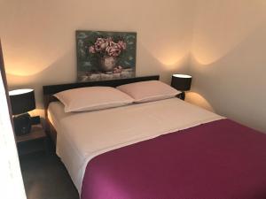 Postel nebo postele na pokoji v ubytování Apartment Klara