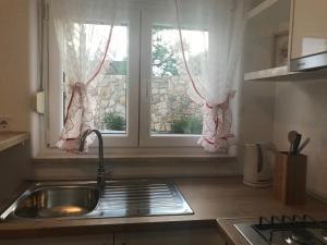 Kuchyň nebo kuchyňský kout v ubytování Apartment Klara + 33 fotografií