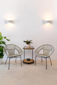 A seating area at 3 Caves by Caldera Houses