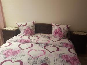 Ένα ή περισσότερα κρεβάτια σε δωμάτιο στο Diana Apartament +8 φωτογραφίες