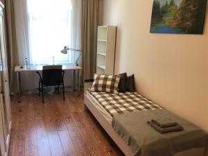 Postel nebo postele na pokoji v ubytování Noclegi Wrzeszcz