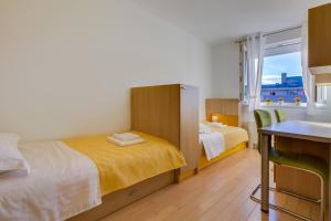 Postel nebo postele na pokoji v ubytování Apartment Pavic - Private parking