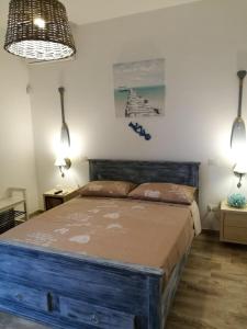 Postel nebo postele na pokoji v ubytování Beach House Salento + 37 fotografií