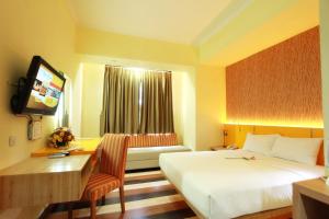 Sjónvarps- og/eða afþreyingartæki á Pandanaran Hotel