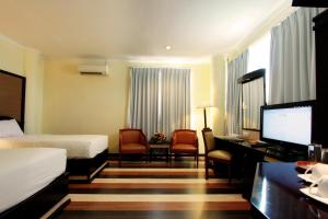 Sjónvarps- og/eða afþreyingartæki á Pandanaran Hotel