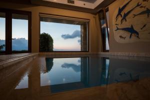 Bazén v ubytování Caneva Luxury Villa nebo v jeho okolí