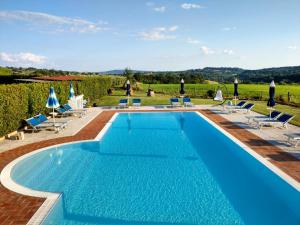 Bazén v ubytování Agriturismo Il Cavallino Saturnia nebo v jeho okolí